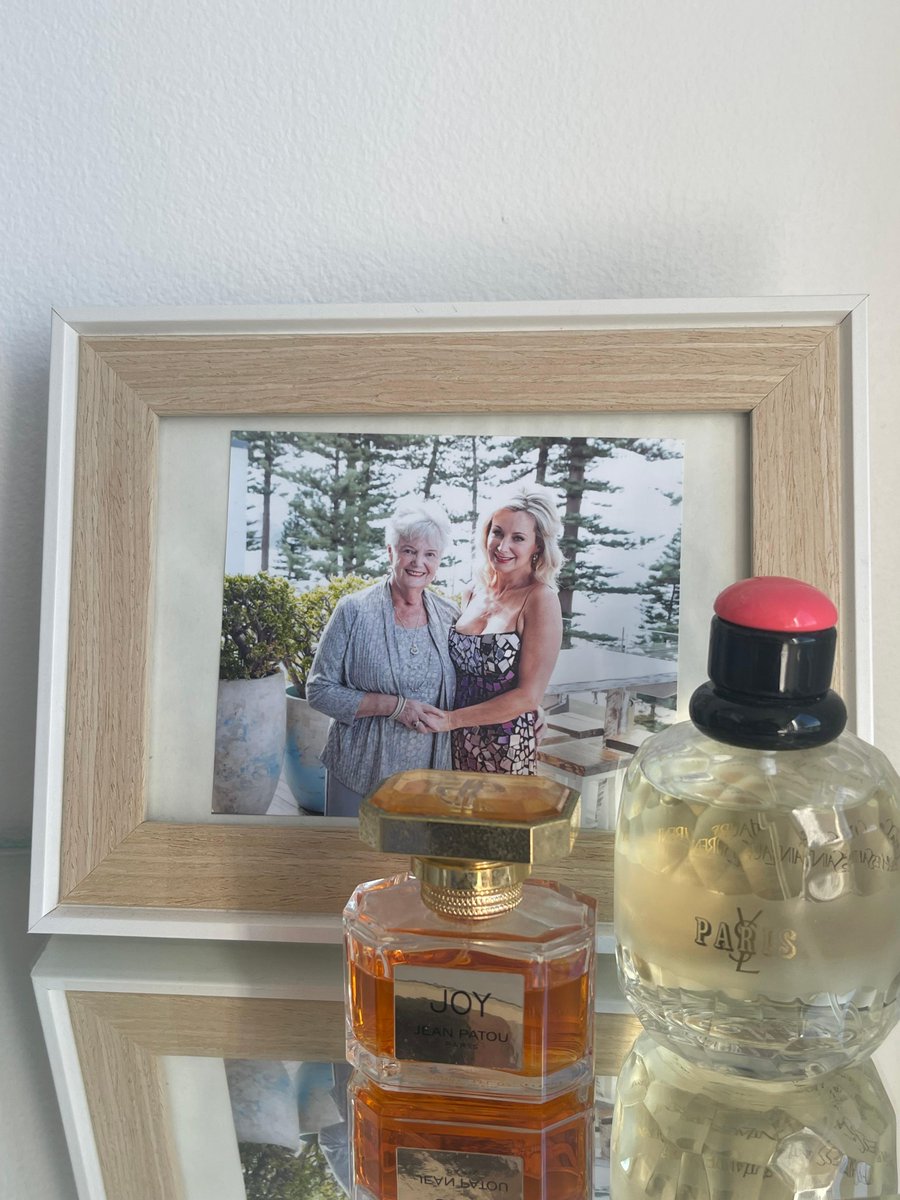 SharonWilliams_'s tweet photo. When Mummy passed away – I did that awful going through her things to decide what to keep and what to pass on. Here’s her picture on my side table with two of her favourite perfumes. Scent brings her back just for a minute.

#mumandI #ysl #love #Yvessaintlaurent https://t.co/LQLIHy5v3P
