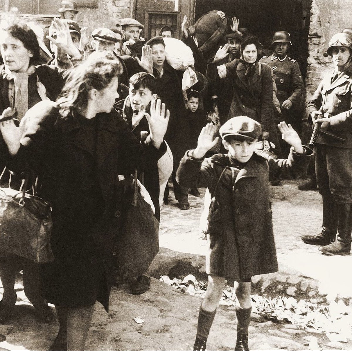 This image is one of the most famous photographs of the Holocaust, captured during the Warsaw Ghetto Uprising which began #OTD April 19, 1943. It was the largest act of resistance carried out by the Jews during the Holocaust. #YomHashoah #NeverForget #NeverAgain