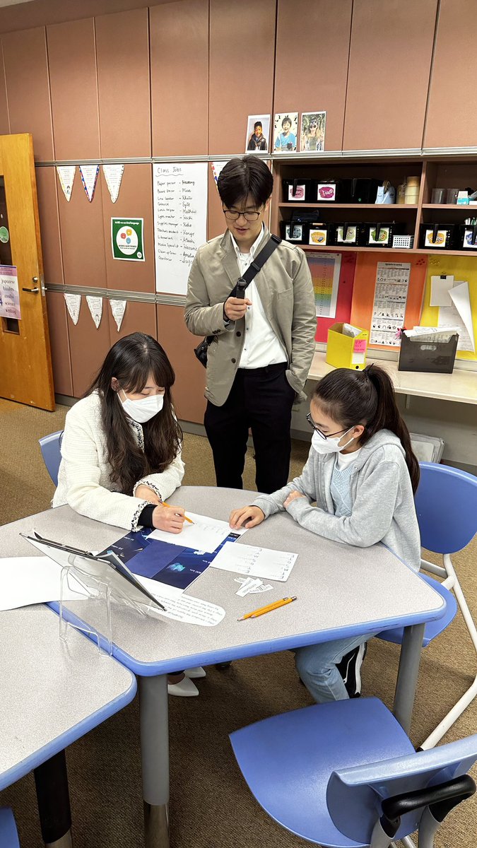 NISGrade4's tweet photo. #CelebrationOfLearning Science Station: today we dared our families to create their own #mnemonicdevice that might help them remember the layers of the atmosphere 🌏 #NISinspire https://t.co/punkyvGiOi