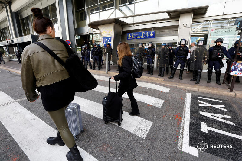 Reuters's tweet photo. Strikes across Europe have led to a spike in flight cancellations, delays and driven down bookings to cities like Paris, despite efforts by airlines to avoid a repeat of last year's disruptions https://t.co/IV7UoqMpQw https://t.co/Iz9avVkNVo