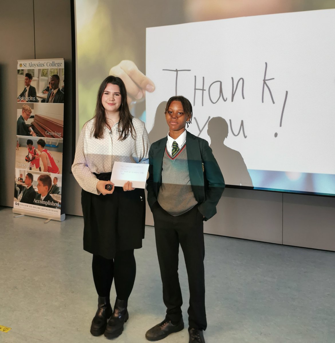 We partnered up with Catholic Social Services for a KS3 assembly on Tuesday. They are an agency 'guided by faith to care for and bring hope to people in need with humility & compassion.' Pictured is Tae Jauen who handed over a cheque to Emily from CSS on behalf of our school.