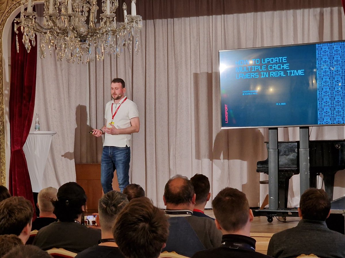 PetrBurian's tweet photo. Now moving to our second Tomas @Georgo and focus on one thing only, CACHES. With 100mil+ users and 2mil+ req/sec caches are most crucial part of our architecture at @Livesport_eu #webexpo https://t.co/iGSPxscfxd