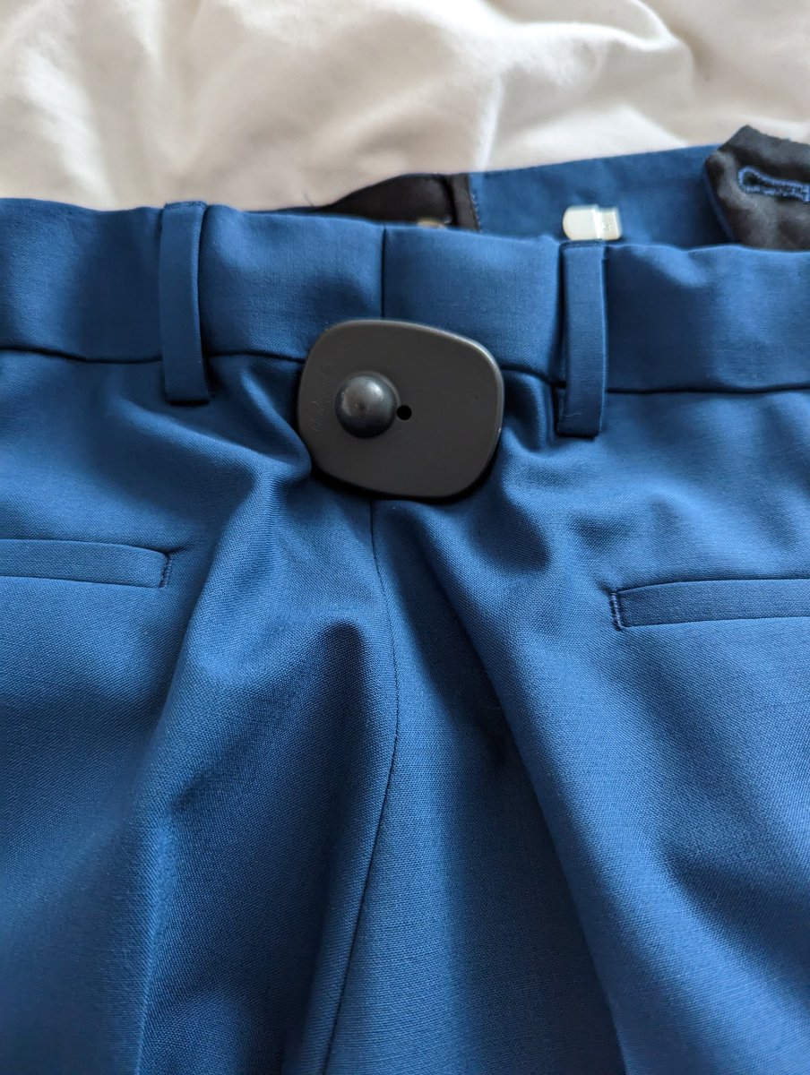 1oony's tweet photo. Bought a suit online from @houseoffraser, found this on the trousers. Any suggestions @HouseofHelpers ? Preferably one that doesn't involve going to a store. https://t.co/igDJ2h1Vpi