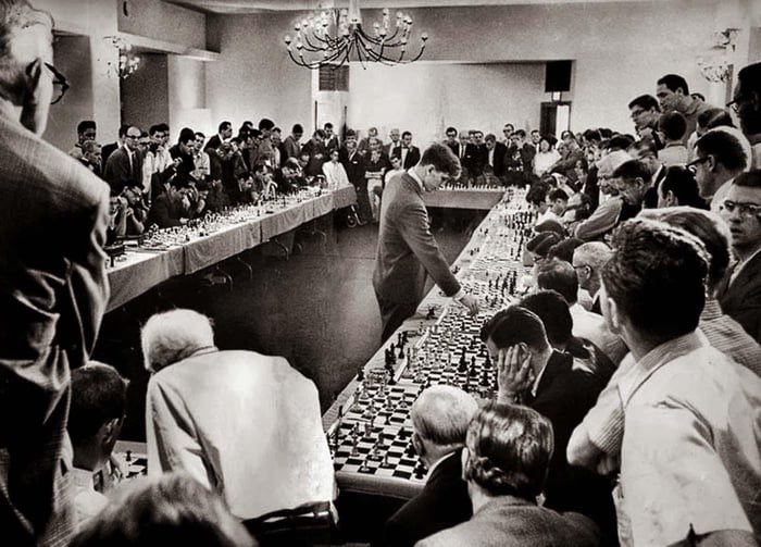 In 1964, Bobby Fischer, aged 21 playing chess against 50 opponents simultaneously, he won 47, drew 2 and lost 1.