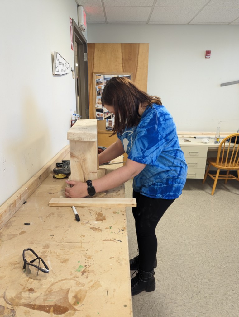 TheIrisNetwork1's tweet photo. Haley is preparing to build a birdhouse in our Manual Arts room. Manual arts, like woodworking, can help people with vision loss develop crucial organizational skills and systematic approaches to manual tasks. #ManualArts #VisionWithNoLimits #VisionImpairment #Blindness https://t.co/hNb99FQxfJ