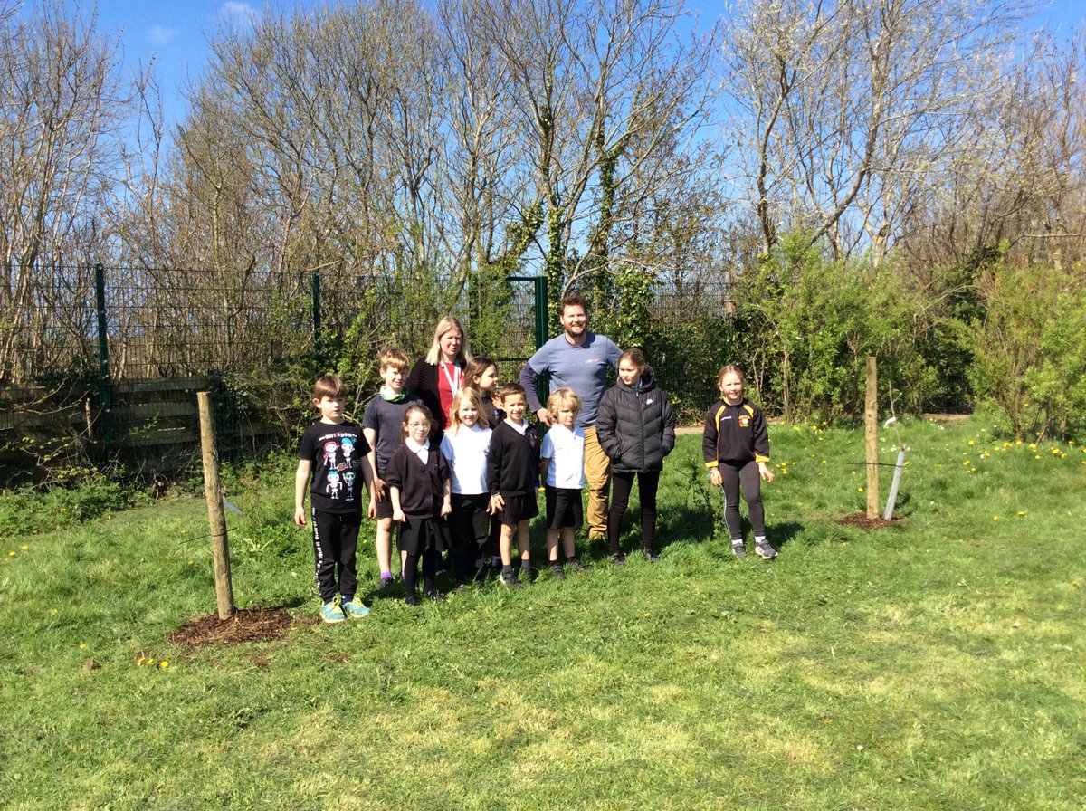 EcoDewiGroup's tweet photo. ๐ณ๐๐๐ณ4 fruit trees planted at @NonYsgol with their Eco Committee as a new Mini Orchard! Thanks to @TCVtweets's From the Ground Up! initiative funded by @ICAPGlobal for the trees & @pembscoast for funding for trees stakes #community #stdavidspeninsula #stdavids #pembrokeshire https://t.co/W4Y9kqXai3
