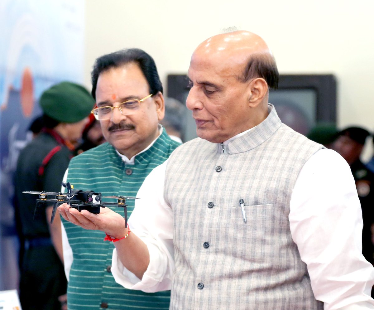 Defence_XP's tweet photo. Report: Raksha Mantri Scoping out a mini drone at an exhibition organised on the sidelines of Army Commanders’ Conference.

#minidrone https://t.co/zRldGWoXmy