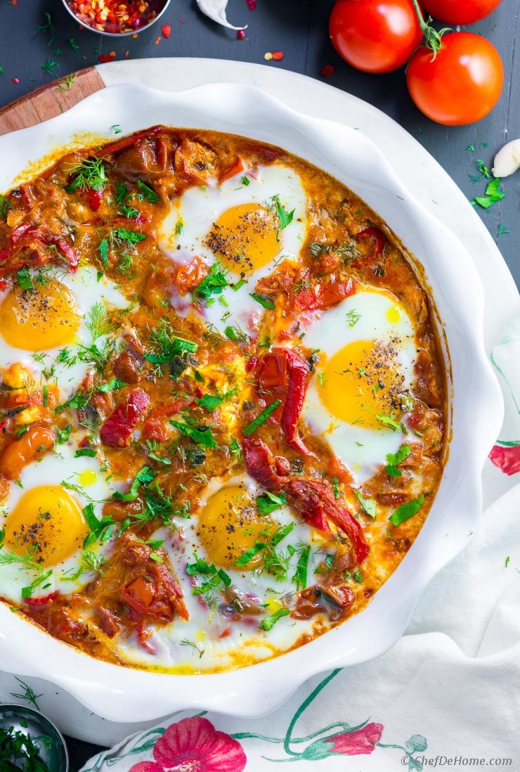 chefdehome's tweet photo. #Recipeoftheday
👉Shakshuka
🔗https://t.co/yhoA86neZa 
Amazing Shakshuka recipe with tomatoes, bell pepper, herbs, and spices cooked to a delicious sauce topped with cheese and soft baked (poached) eggs.  It is a simple and easy breakfast recipe with humble every-day ingredien… https://t.co/Nzd4AQdaB4