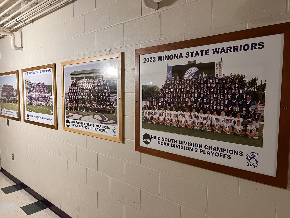 Coach_Bergy's tweet photo. Officially added the @WinonaState_FB 2022 squad the locker-room hallway.   A long history of success preceded them and many will follow.

Honor the past while raising the bar and setting the standard for the future. 

GRIT. GROWTH. TEAM. https://t.co/5KHZ3uD0nD