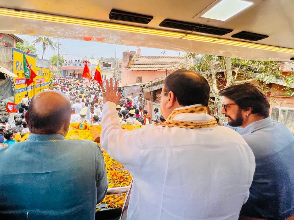 Tejasvi_Surya's tweet photo. Sri @JPNadda, BJP National President, participated in a road show in Haveri along with CM Sri @BSBommai today.

People of Haveri are backing @BJP4Karnataka to form Govt with thumping majority.

#BJPYeBharavase https://t.co/a9ywR8Hibs
