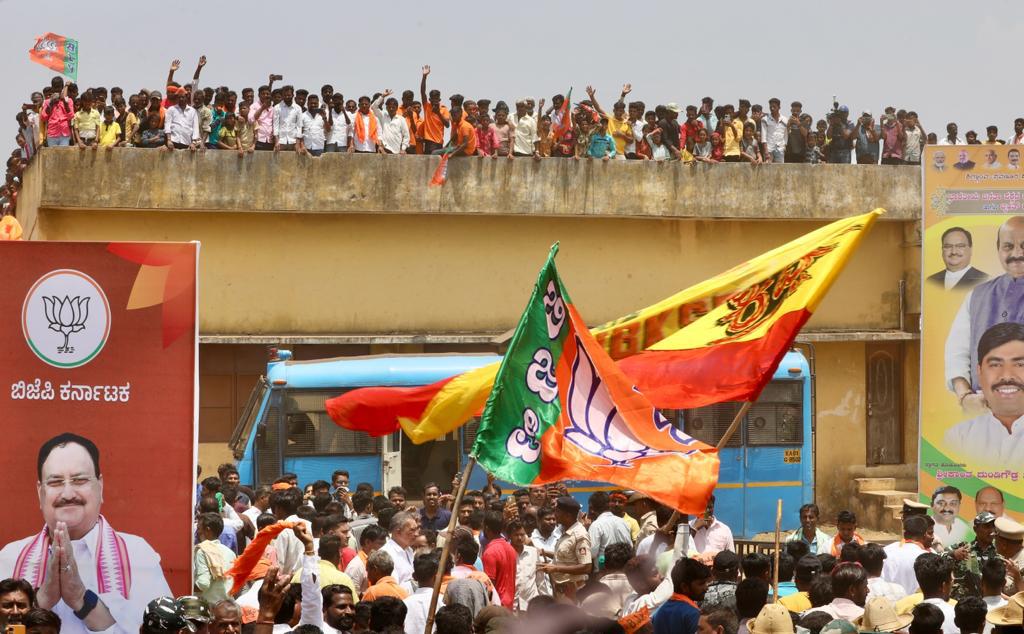 Tejasvi_Surya's tweet photo. Sri @JPNadda, BJP National President, participated in a road show in Haveri along with CM Sri @BSBommai today.

People of Haveri are backing @BJP4Karnataka to form Govt with thumping majority.

#BJPYeBharavase https://t.co/a9ywR8Hibs