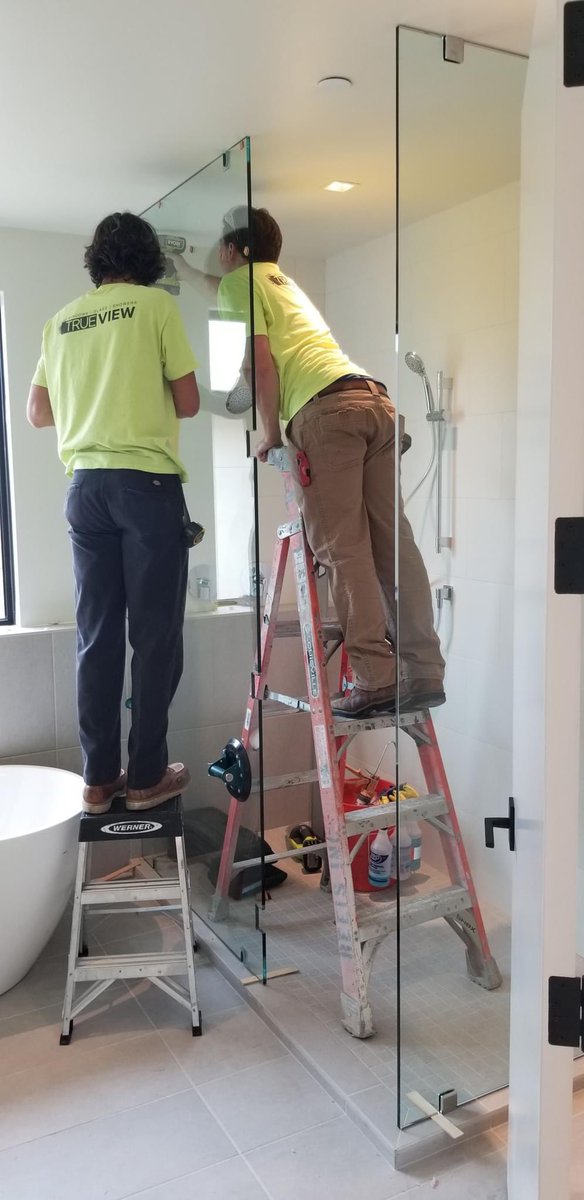 TrueViewGlass's tweet photo. Some great shots of the True View techs hard at work! It's always fun to see how new glass shower doors can take a bathroom to the next level. 

#DenverWindowRepair #DenverGlassRepair #ArizonaWindowRepair #TucsonWindowRepair #PhoenixWindowRepair #PhoenixWindows #TucsonWindows https://t.co/d8BxJadYWv