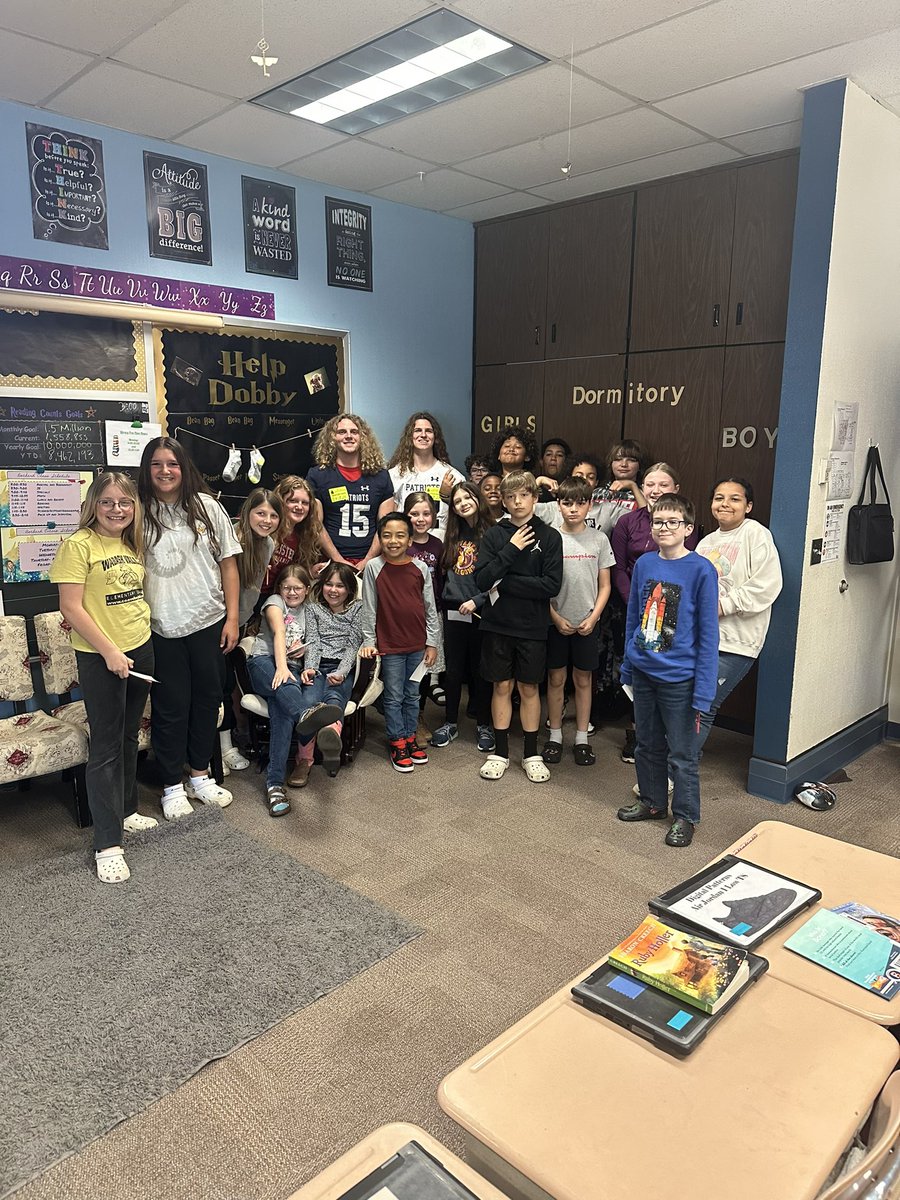THNfootball's tweet photo. THN Football went and read to DeVaney elementary yesterday! Great talks! The kids loved the book and the message behind it! WE ARE ENOUGH! https://t.co/WbRSlER2Y0
