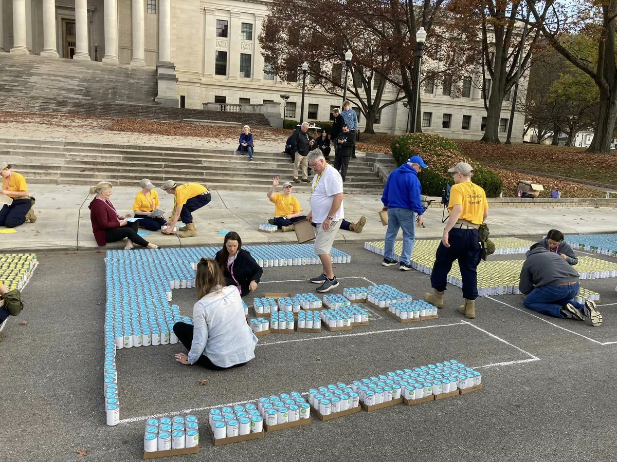 WVNationalGuard's tweet photo. Our Mountaineer ChalleNGe Academy received their Guinness World Record certificate!
MCA-South cadets joined @MtMissionInc, spelling MOUNTAINEERS using 25,550 cans of new food (donated to MtM food pantry) on Kanawha Blvd at the West Virginia State Capitol. 
👀 cadets in gold. https://t.co/uja1yEdwox