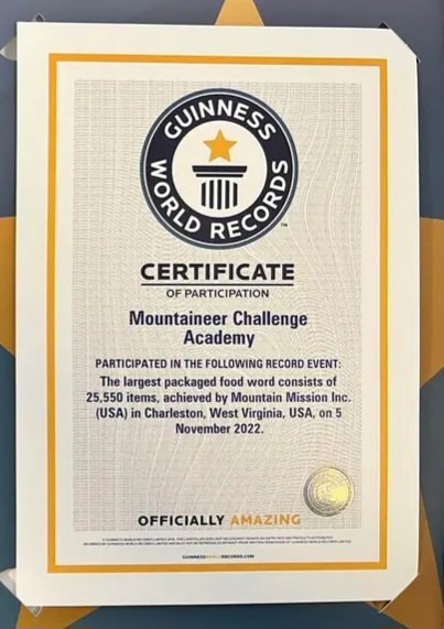 WVNationalGuard's tweet photo. Our Mountaineer ChalleNGe Academy received their Guinness World Record certificate!
MCA-South cadets joined @MtMissionInc, spelling MOUNTAINEERS using 25,550 cans of new food (donated to MtM food pantry) on Kanawha Blvd at the West Virginia State Capitol. 
👀 cadets in gold. https://t.co/uja1yEdwox