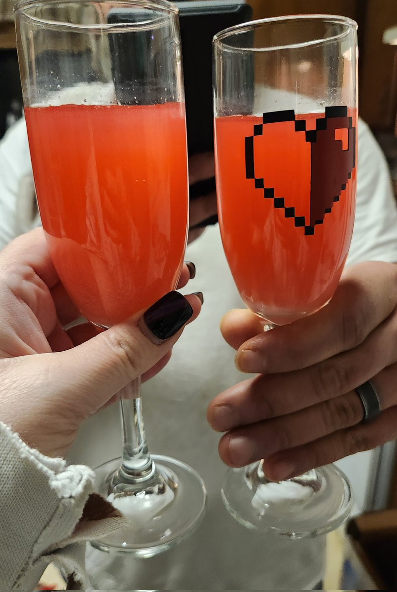 MrsRivera1085's tweet photo. @GFuelEnergy My husband @cigris85 and I totally forgot our champagne toast at our wedding..so the next day, we toasted with Red Ooze! This #gamercouple loves GFuel❤️ #nerdwedding #gfueltoast #venom https://t.co/pVd2o73U2j