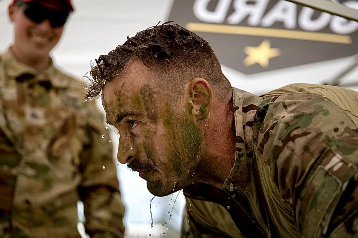 GeorgiaGuard's tweet photo. Sergeant Nicolas White, an indirect fire infantryman representing the Georgia Army National Guard, splashes water on his face after completing the confidence course during the Region III @USNationalGuard Best Warrior Competition at Fort Stewart, Georgia, April 17, 2023. #GaStrong https://t.co/c2JVidlCMV