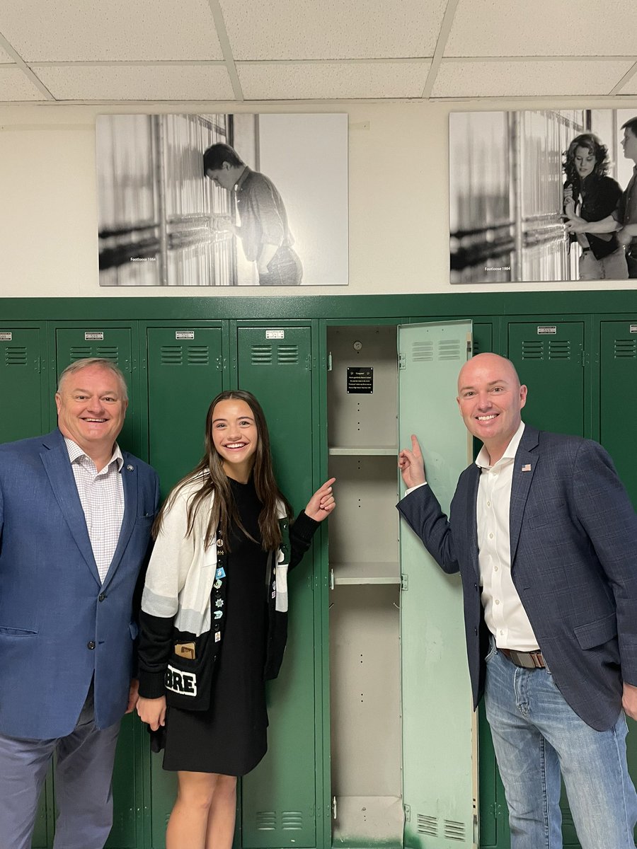 MikeLMower's tweet photo. Student Council President Bre Jardine showing @GovCox the locker @kevinbacon used when he was a student at @PaysonLions.  Great students and faculty. Gotta love a city that is home to Footloose and @jaceyskinner. #ConnectingUtahTour #❤️Payson. https://t.co/3X47NG3uCU
