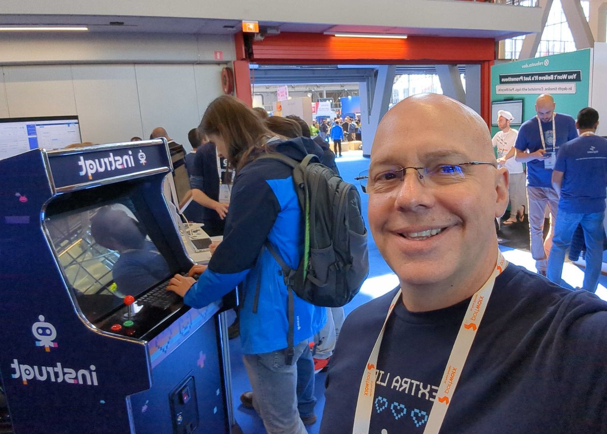 instruqt's tweet photo. "We're having a blast at #kubecon23 and #cloudnativecon! Come say hi at booth SU10 and check out our innovative product demo and training platform. Plus, play our retro-inspired Instruqt arcade - it's a total hit! 🕹️👾" https://t.co/7Y88Dy4FXA