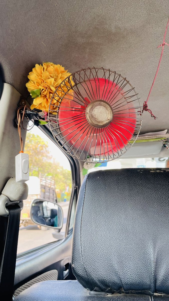 mohit2599's tweet photo. I booked @Uber during my vacation in India. I asked for Uber Go and when it arrived this was the condition of cab. I asked about AC for 38 degree weather then driver pointed finger to this Fan.
What @Uber_India shows in ads vs reality. #uber #jugaduUber https://t.co/kULLQmxLlY