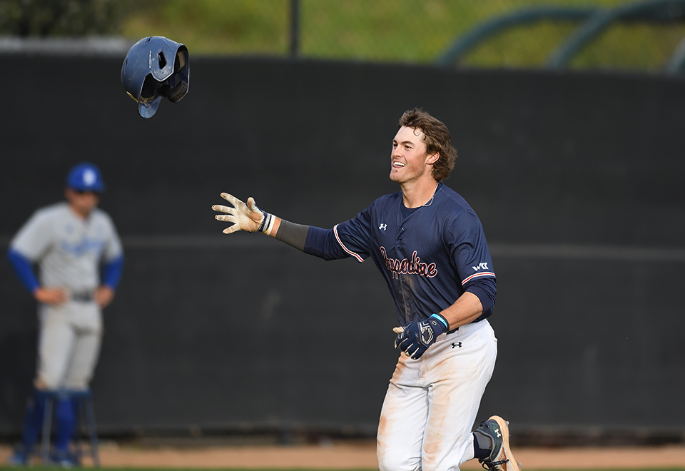 PepperdineIT's tweet photo. Pepperdine's John Peck gets swarmed after his two-run walk-off home run in the bottom of the 10th inning yesterday against UCSB at Eddy D. Field Stadium in Malibu. In the Waves 4-2 win @johnpeckiv was 3-5 with two home runs and 3 RBI. @pepperdinebaseball @willythewave https://t.co/p79ark2RkR