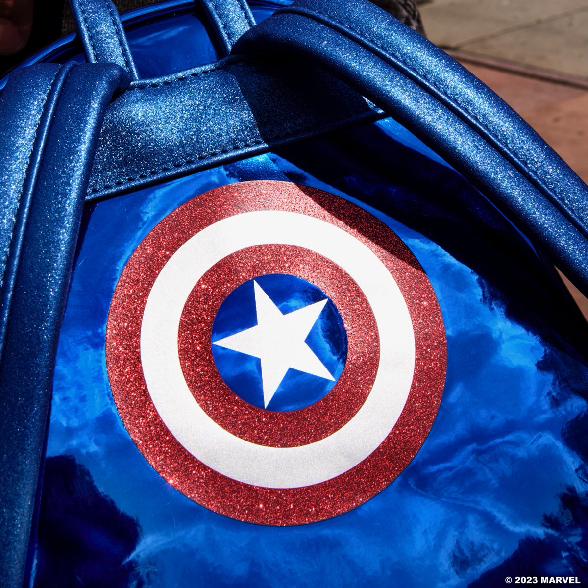 Loungefly's tweet photo. Suit up and shine like an Avenger with the first in our #Marvel Metallic Series! https://t.co/7qpj0jPl4r https://t.co/xf1wg9OHd0