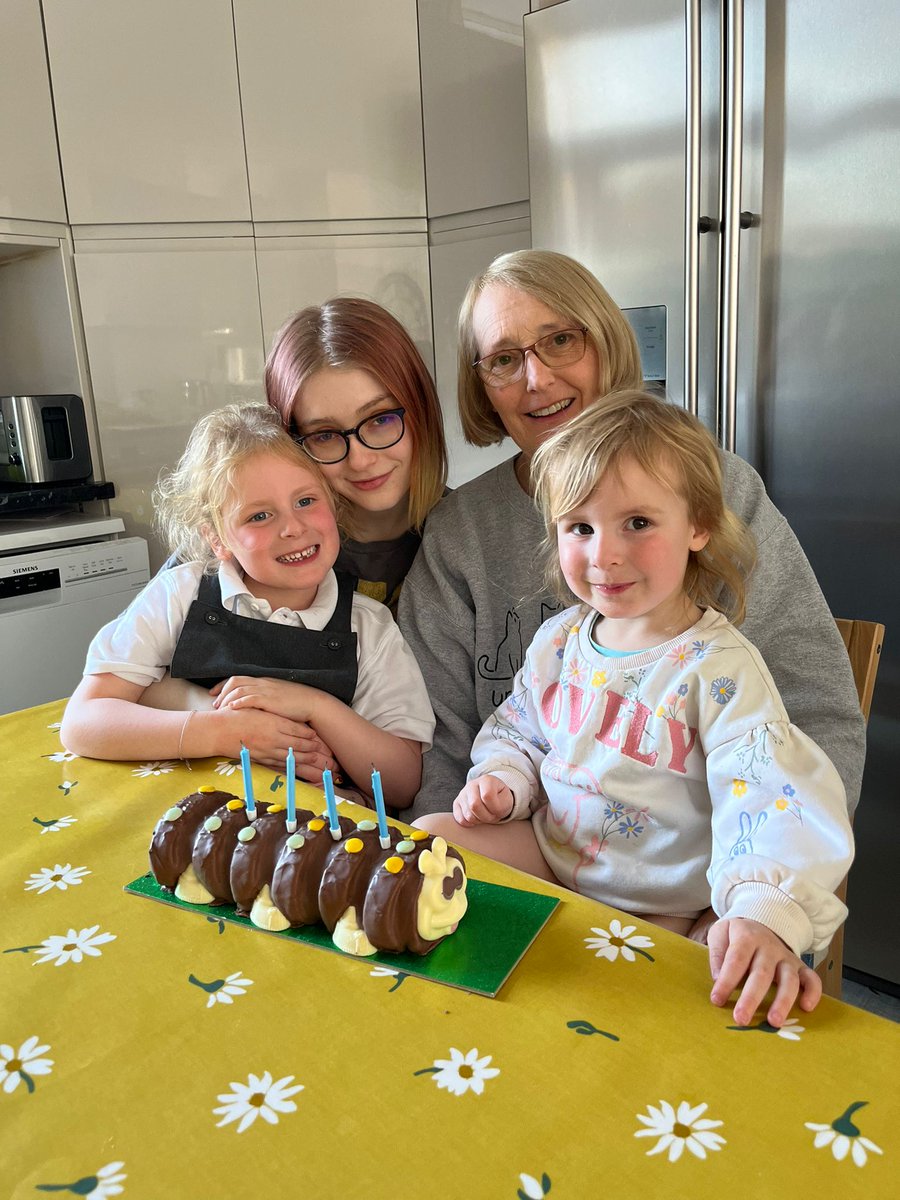 246calm's tweet image. Being helped by all the  grandchildren with my birthday cake, a Colin the caterpillar of course!
