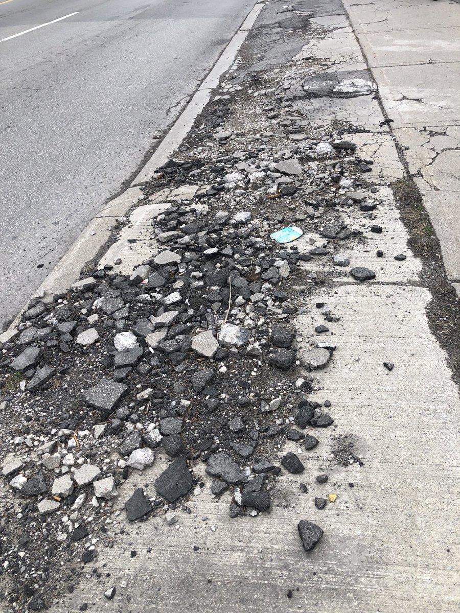 Look at the state of the sidewalks along Main Street East - hey <a href="/cityofhamilton/">City of Hamilton</a> pedestrians deserve better than this sorry state of affairs - is there any sort of sidewalk sweeping planned for our city's main streets?? #HamOnt