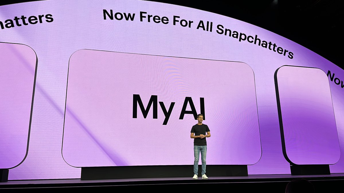richontech's tweet photo. Snap is opening up its MY AI chatbot to all users free rolling out starting today. You can @ mention it in a chat with a friend to bring it into a conversation. For paying subscribers you can now send a snap to your chatbot and it will reply with a snap too. #SnapPartnerSummit https://t.co/d7oxowI9Yv