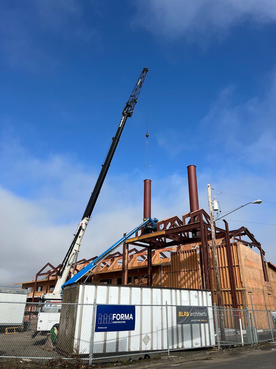formacc's tweet photo. We took a twist on the traditional topping off ceremony, having the whole team — @PortofKalama, Port Commissioners, @BLRBarchitects, FORMA, and all of our subcontractors — sign the smokestacks of the Mountain Timber Market. 🤓🏭 https://t.co/DSLgpJVH9l