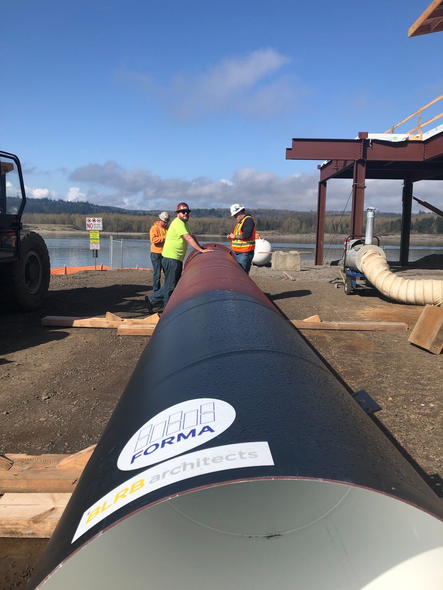 formacc's tweet photo. We took a twist on the traditional topping off ceremony, having the whole team — @PortofKalama, Port Commissioners, @BLRBarchitects, FORMA, and all of our subcontractors — sign the smokestacks of the Mountain Timber Market. 🤓🏭 https://t.co/DSLgpJVH9l