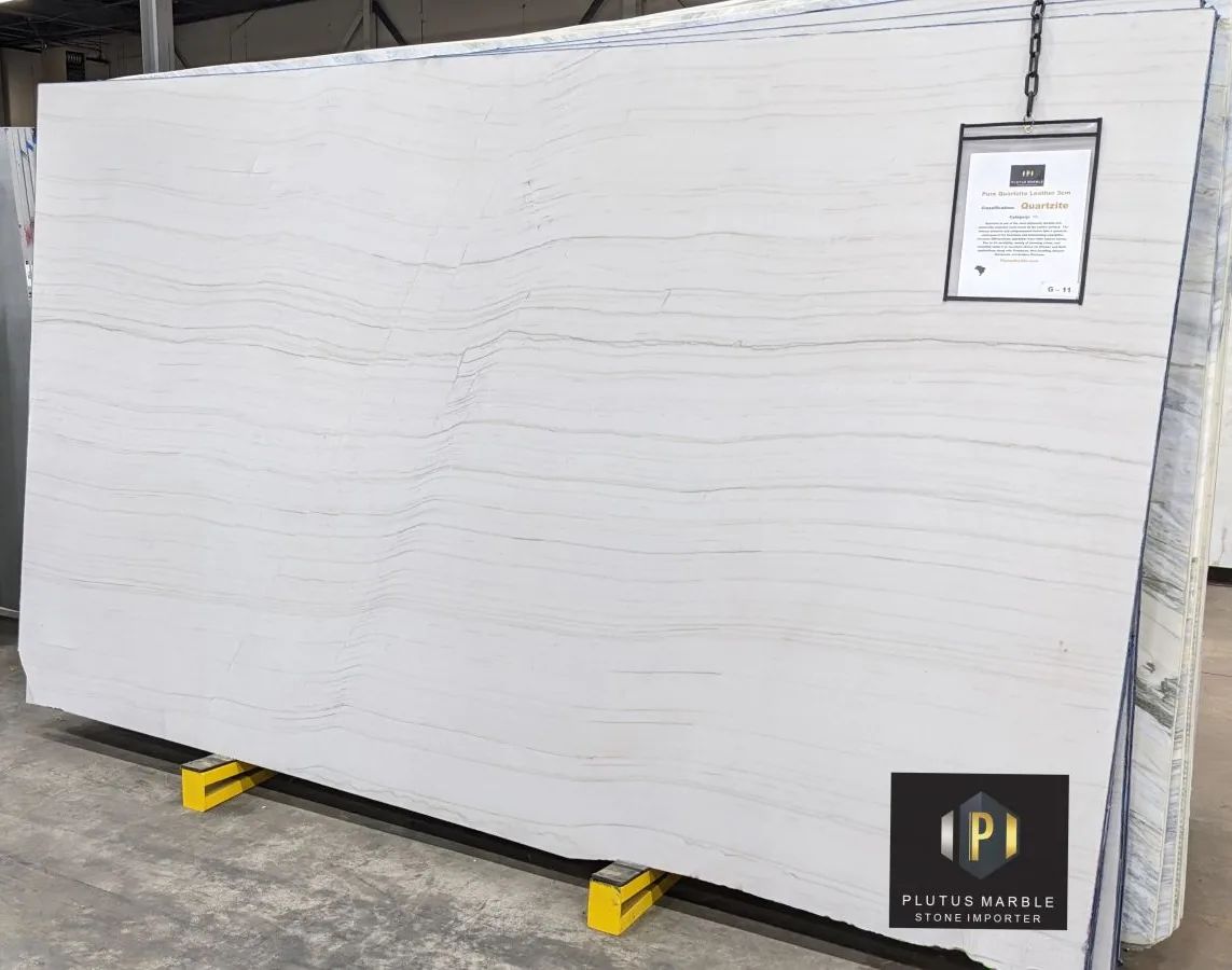 PlutusMarble's tweet photo. Pure Quartzite is the perfectly neutral quartzite with a leathered finish we know you'll love. The warm and cool tones create a perfect balance to bring some harmony to your countertop design.  #QuartziteCountertops #UseNaturalStone #PlutusMarbleIndy #MeetMeAtPlutus https://t.co/MlPjCWcEAI