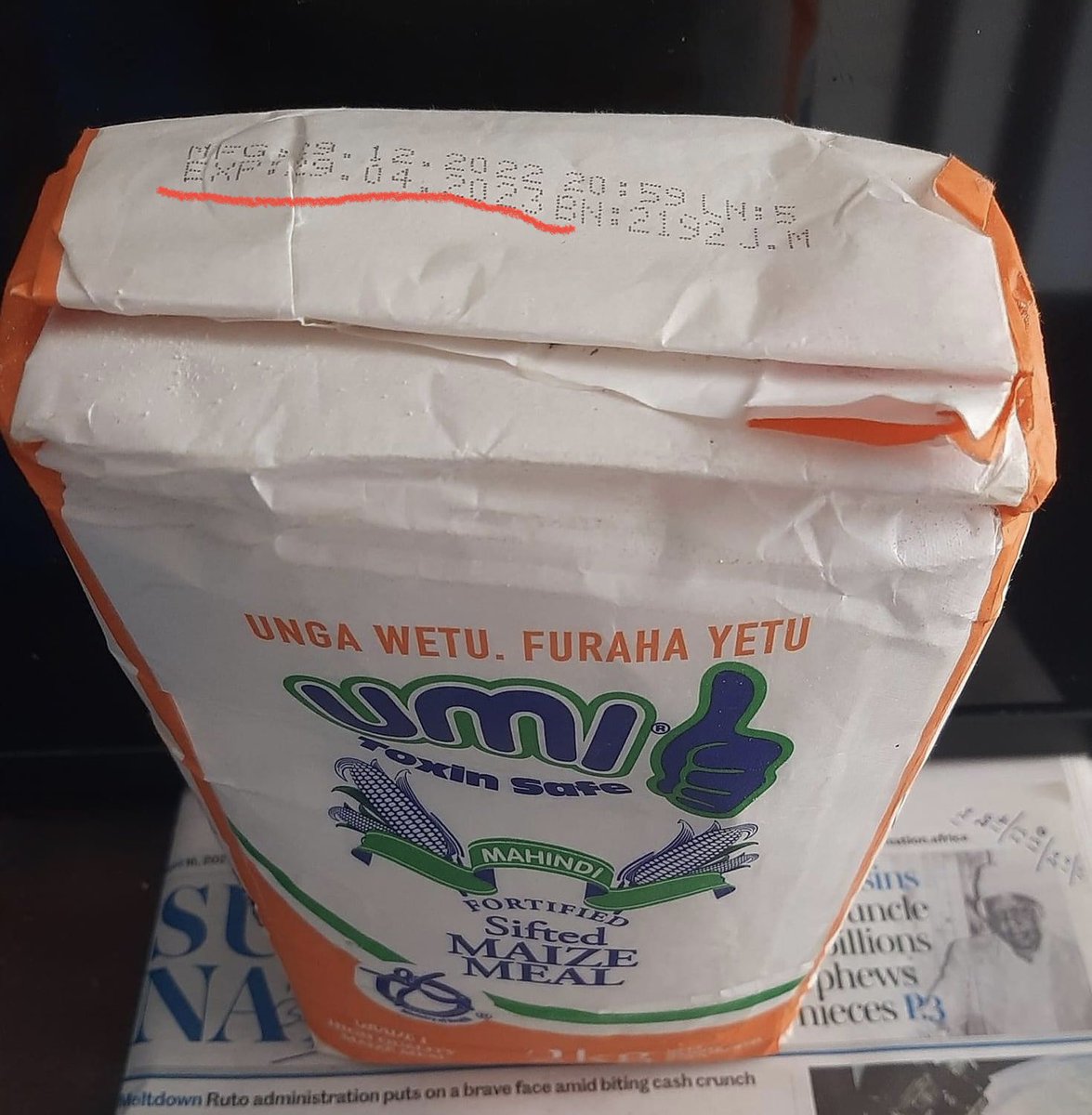 paulinenjoroge's tweet photo. We were told that some maize milling companies (read company) have been able to reduce their prices because of government’s intervention of removing importation tax on maize. Let me ask, even this flour which was manufactured in December 2022 and is expiring in 10 days was produced from maize that was imported tax free recently? 
Toxin safe my foot!