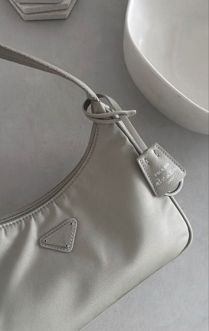 KiraBrookk's tweet photo. prada https://t.co/i00mepArrg