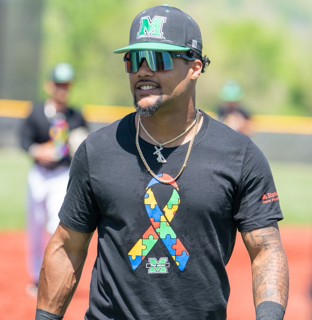HerdBaseball's tweet photo. Today, the team wore special warmup shirts in honor of our Autism Awareness Game here at the Kennedy Center 🧩

#WeAreMarshall https://t.co/xrMh6JuJEh