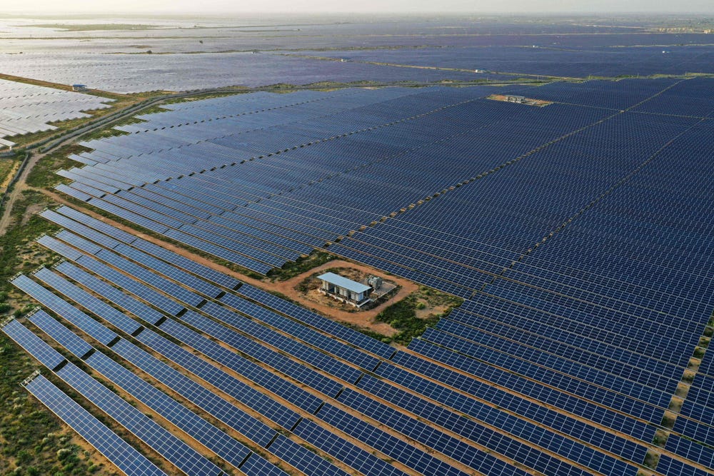 the largest solar farm in the world: 14,000 acres located in rajasthan, india
