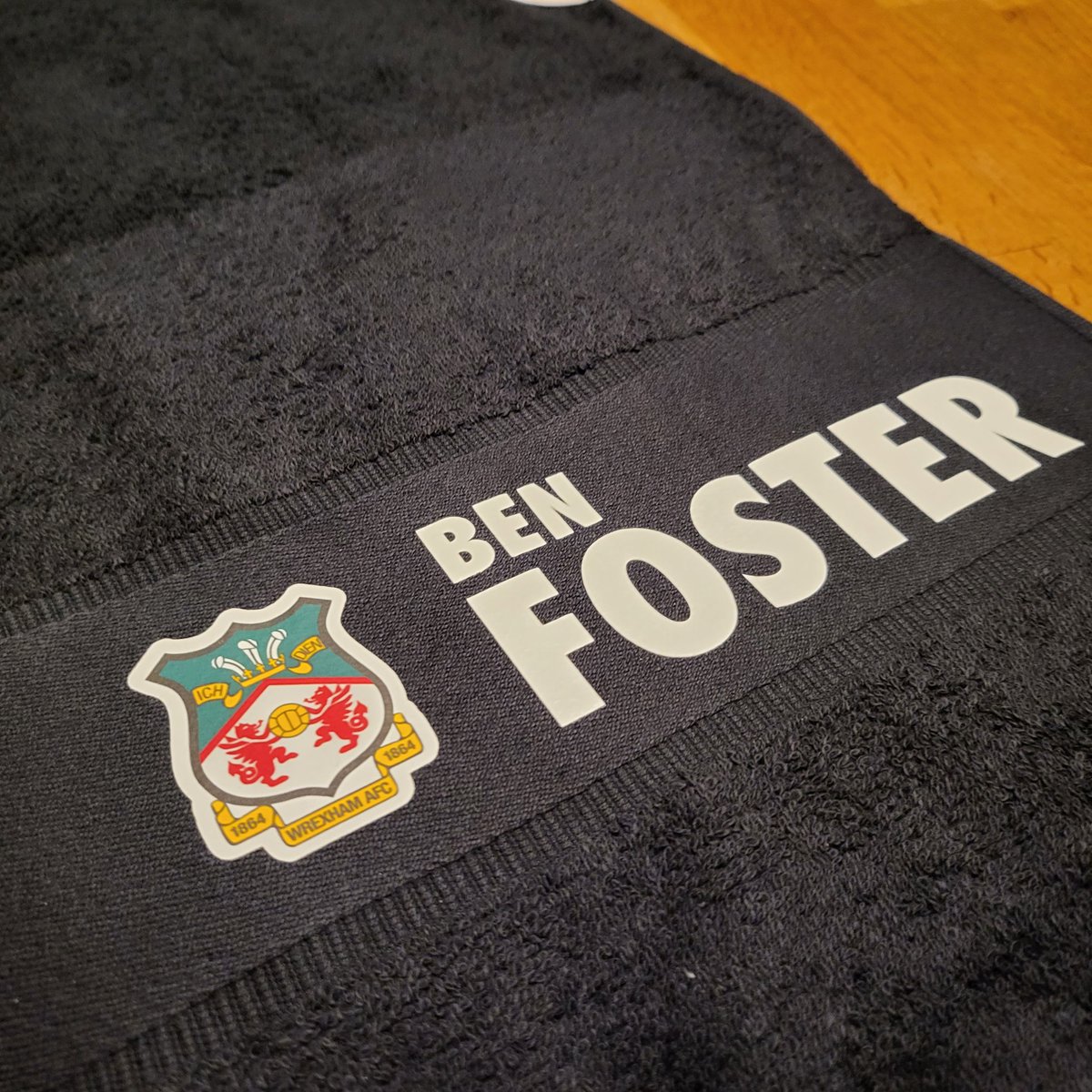 HusonDesign's tweet photo. In celebration of the incredible penalty save last week, we have made this gift for @BenFoster of @Wrexham_AFC 

Help us get this gift to Ben!! A custom goalkeeper towel!

@VancityReynolds can you help?

#football #wrexhamfc #benfoster #ryanreynolds https://t.co/vu7b4mLqmN