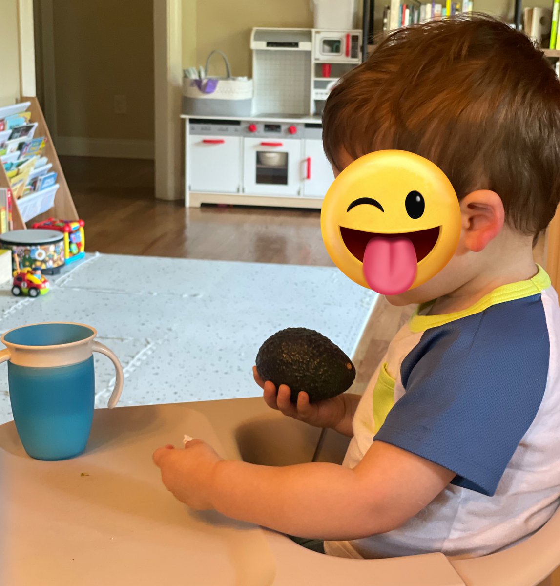 VanessaMP's tweet photo. What weird item does/did your kiddo like to hold during earlier toddlerhood? Ours really digs avocados 🙃 https://t.co/tV5pZJDuYF