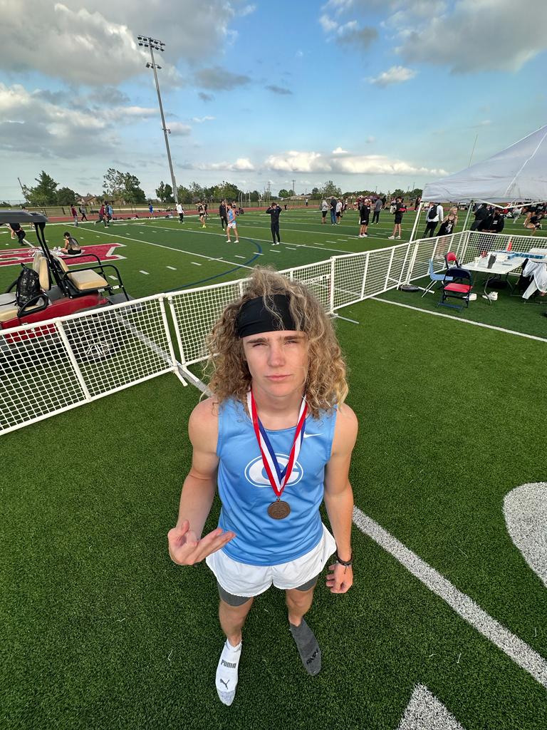 GtownTrack's tweet photo. Tyler Duncan finds himself on the podium yet again.  Impressive showing in the 110m hurdles. 🥶 + long hair = 💨  #GeorgetownSpeed https://t.co/wz9BQmcwus