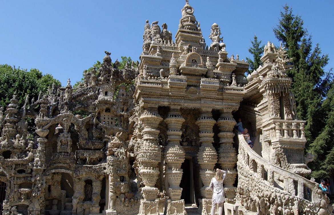 AmorArchCorp's tweet photo. #HappyBirthday to Ferdinand Cheval, a postman,  who spent 33 years building a palace out of pebbles and rocks he collected during his daily mail route. Cheval's "ideal palace" is more famously known as Le Palais idéal, which means "the ideal palace." #LePalaisideal #Cheval https://t.co/FBsWdT34Qn