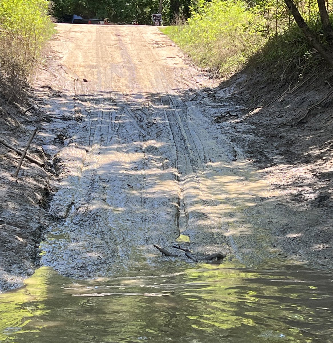 SRiderfishbio's tweet photo. If you’re a #river biologist you know this is a typical boat launch in the spring- 2’ feet deep of muck to get thru just to launch. #Trotlines soaking!!! https://t.co/0NeYff1BSn
