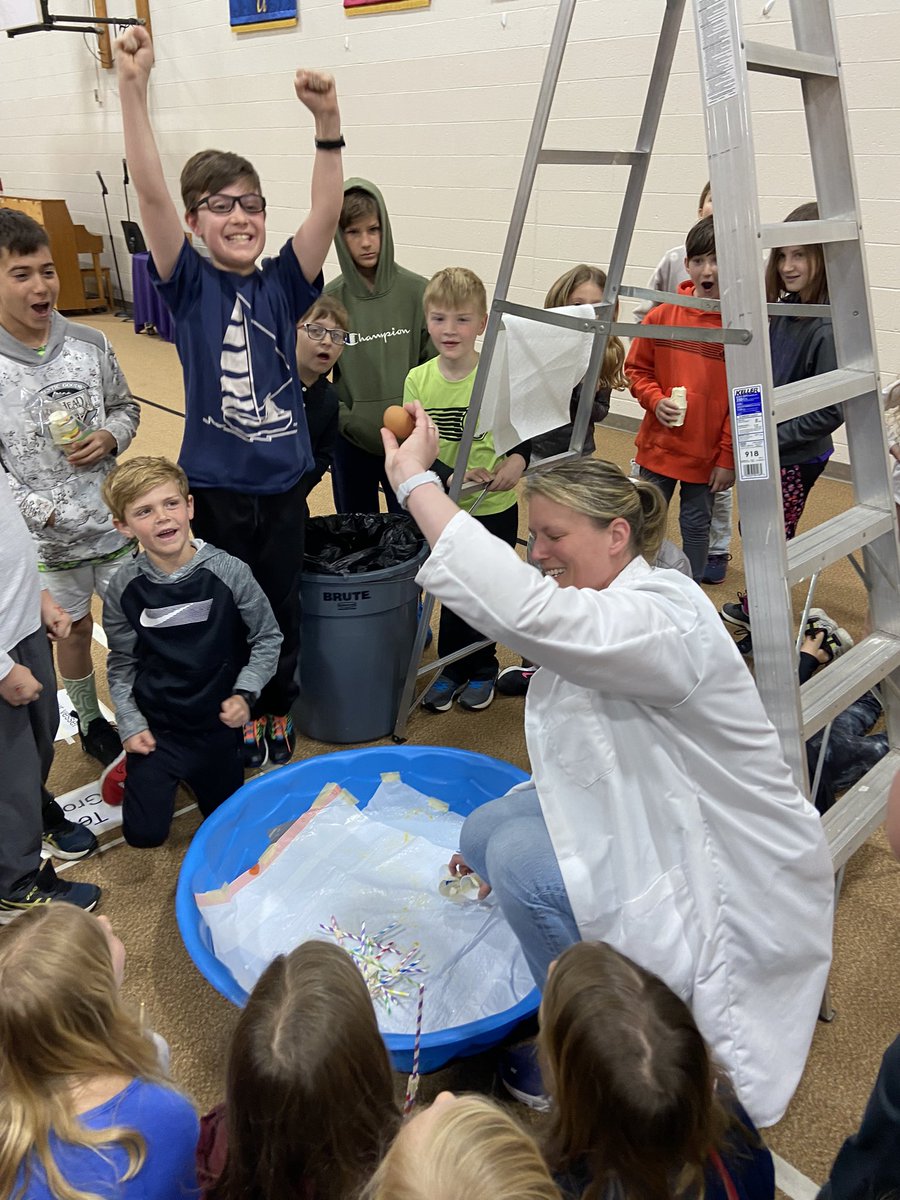 Sheiladokter's tweet photo. 1st &amp; 5th grade buddies worked with Meredith Steenwyk, Project Engineer from Gentex, this morning. The goal was to collaboratively construct a vessel that would protect an egg from a 10 foot drop. Thank you, Meredith and @GentexCorp! #HollandChristian #EggDrop #STEM https://t.co/ixViRndZDs