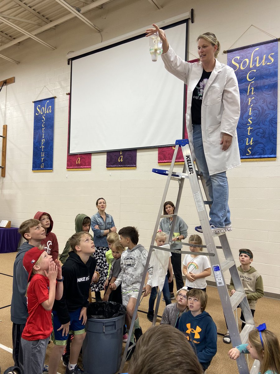 Sheiladokter's tweet photo. 1st &amp; 5th grade buddies worked with Meredith Steenwyk, Project Engineer from Gentex, this morning. The goal was to collaboratively construct a vessel that would protect an egg from a 10 foot drop. Thank you, Meredith and @GentexCorp! #HollandChristian #EggDrop #STEM https://t.co/ixViRndZDs