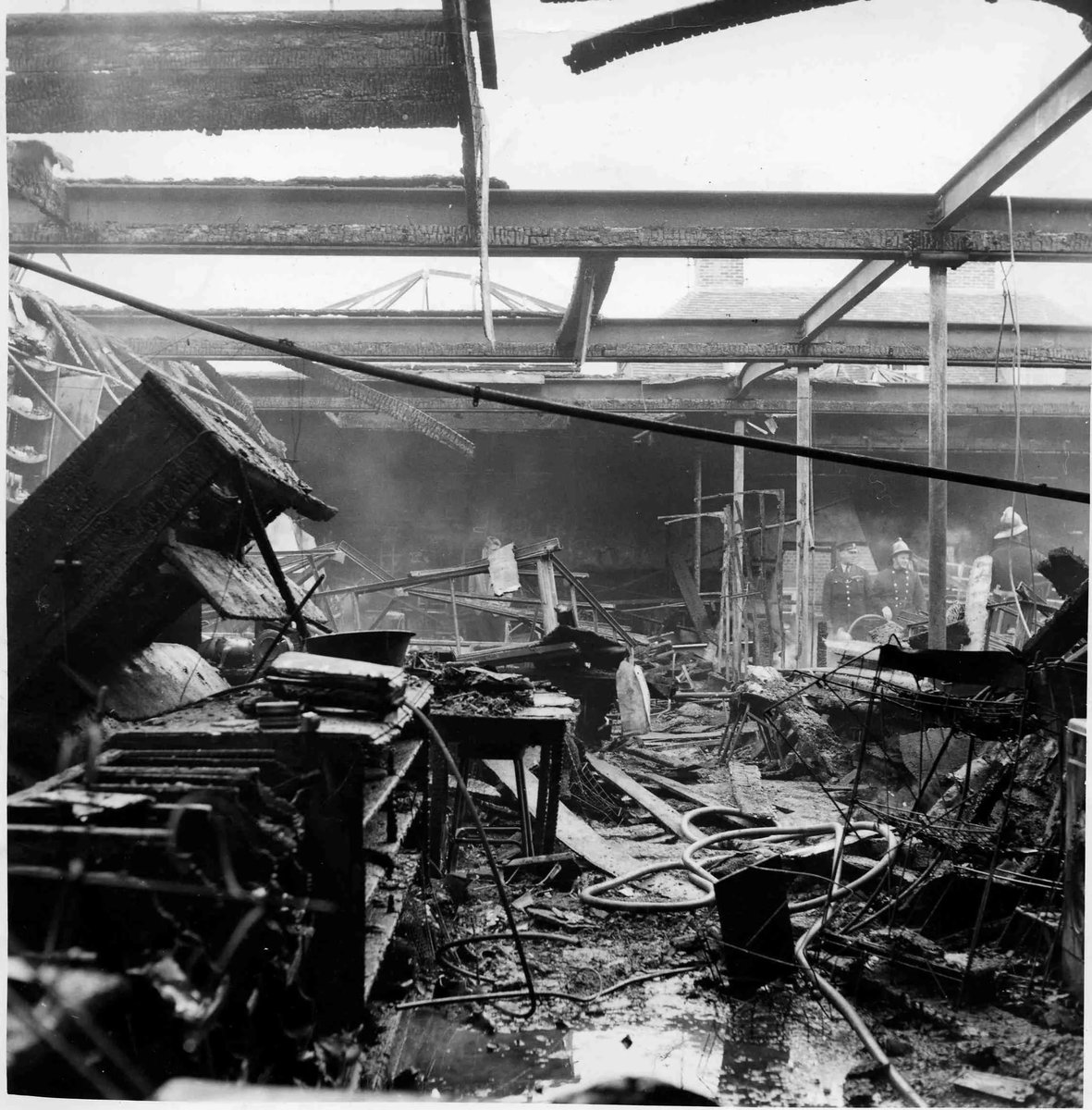 WBerksMuseum's tweet photo. 62 years ago today, much of Newbury’s House of Toomer department store was destroyed by a major fire. The store re-opened only four days later. See more images in our House of Toomer exhibition Images of NEBYM:2001.42 copyright West Berkshire Museum. #fire #Toomers #Newbury https://t.co/DPhUwz8wOr