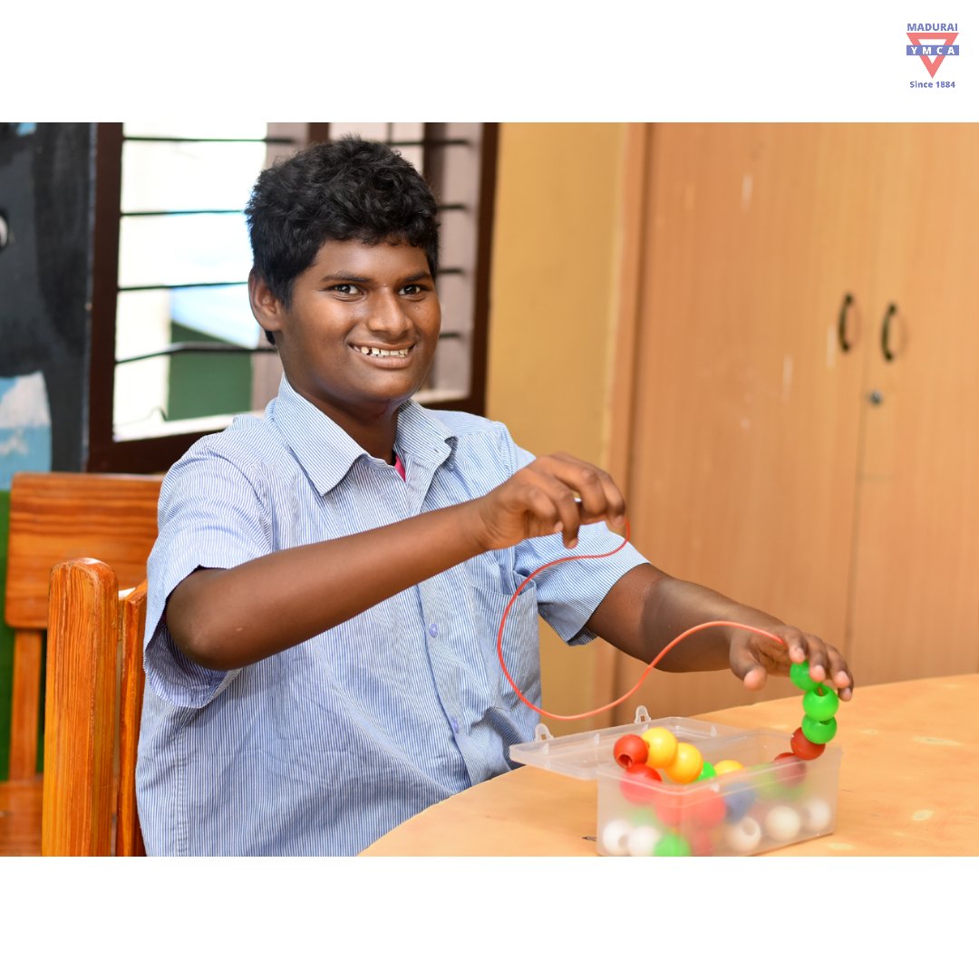 YmcaMadurai's tweet photo. At #YMCAMadurai,special children are given various activities to develop their #finemotor& #visualmotor skills. One of them is #stringingbeadsactivity,helps to improve special child's #eyehandcoordination.Parents of #specialchildren encourage ur child to do this activity at home. https://t.co/OG3bXdNpy3