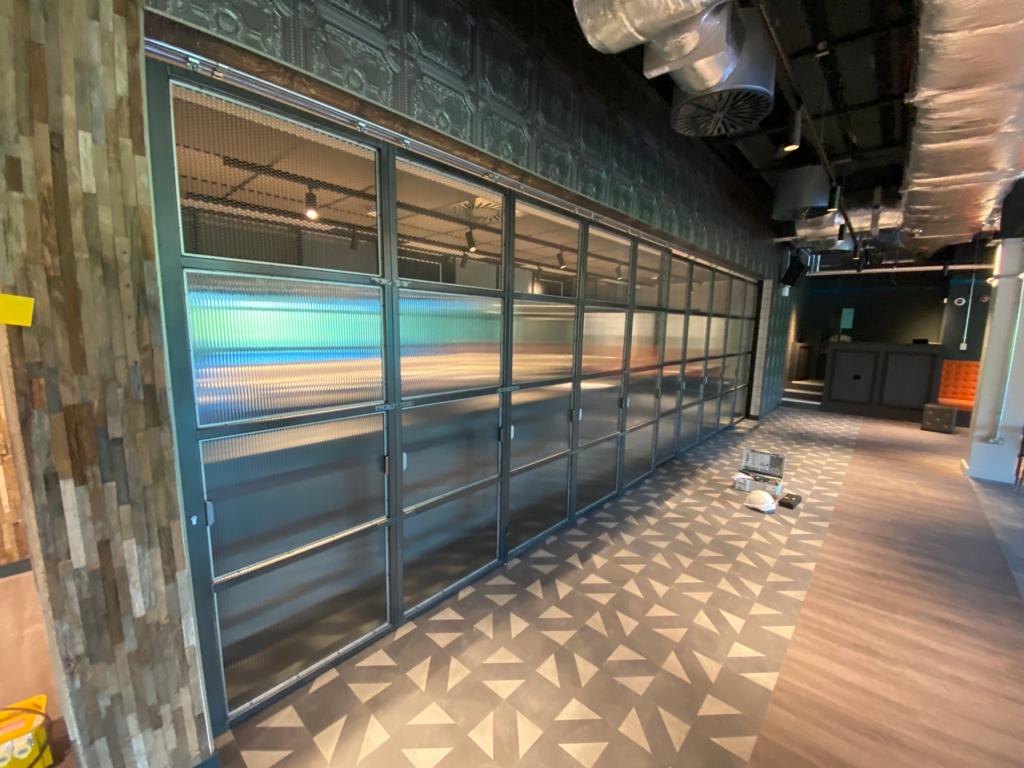 createthatedge's tweet photo. A University customer needed a security solution for its bar area but also wanted it to look good, so we designed, manufactured and installed these rolling shutter doors.
#creativeedge #designandbuild #shutterdoors
#projectwork #design https://t.co/16XpSlWInV
