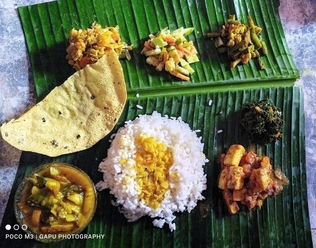 Hello, my lovely friends! I hope you're having a wonderful day 💕

Today, I want to share with you one of my favorite things in the world - a veg lunch served on a banana leaf 🍌

There's something magical about eating on a banana leaf that makes me feel so happy and grateful …