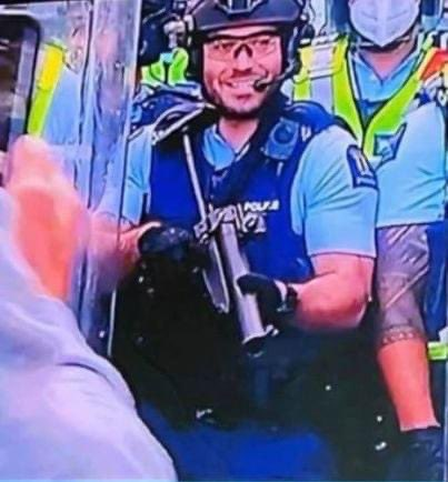 comms24_c24's tweet photo. @saltyreigns Jabcindy Goebbels ArGerm's policemen were laughing. What type of person laughs at peaceful mom, pop and grandma's AND children telling Jabcindy to end discrimination. #Arrest_Ardern #end_discrimination #ban_covid_vaxx #Nuremberg2NOW https://t.co/u4PQMDLfVK