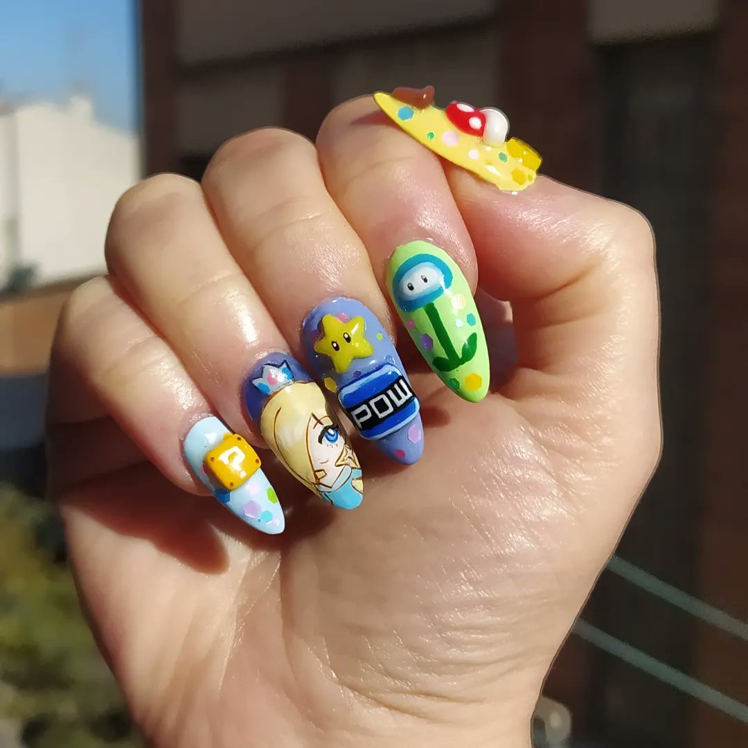 marionshkav's tweet photo. Inspo Nails by insta/dejauwo
Peach and Rosalina by @meowwniz
1week working on this💅
#nails #supermariobros #nailart #gelnails #supermariobrosmovie #videogamenails https://t.co/tNbEIKi7pY