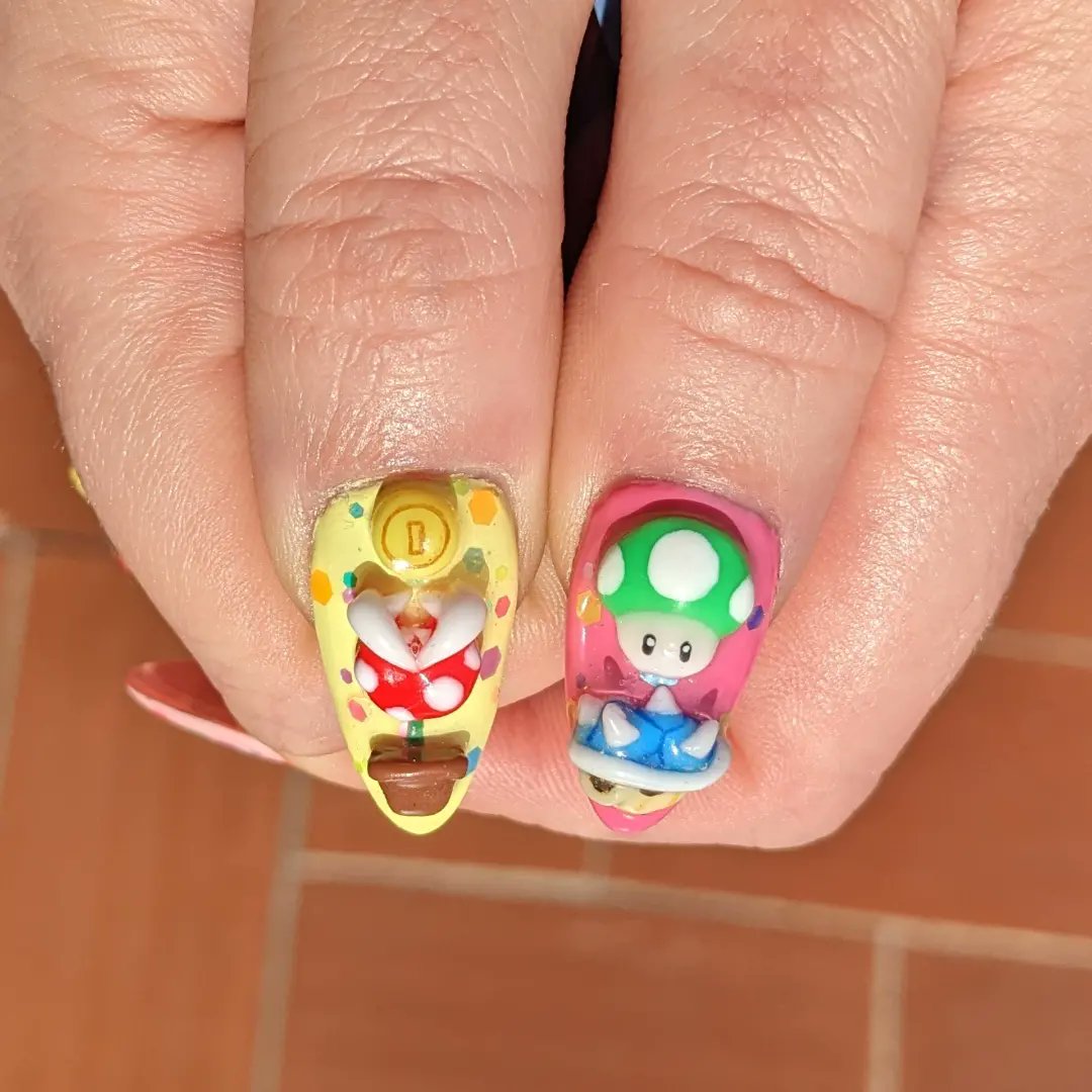 marionshkav's tweet photo. Inspo Nails by insta/dejauwo
Peach and Rosalina by @meowwniz
1week working on this💅
#nails #supermariobros #nailart #gelnails #supermariobrosmovie #videogamenails https://t.co/tNbEIKi7pY